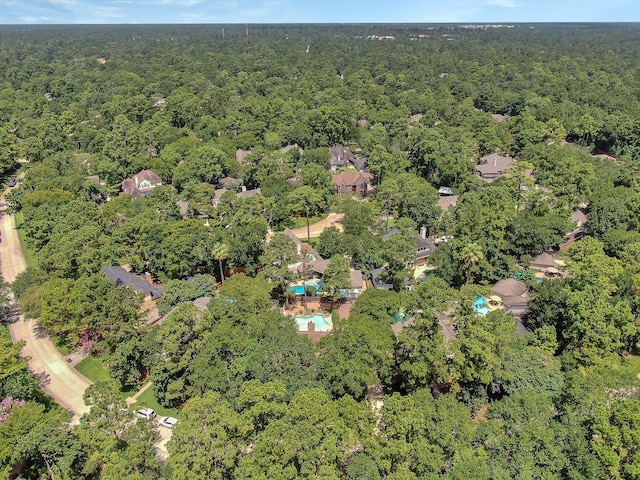 35 S Floral Leaf Cir, The Woodlands, TX 77381 - aerial overview of property's location with a heavily wooded area