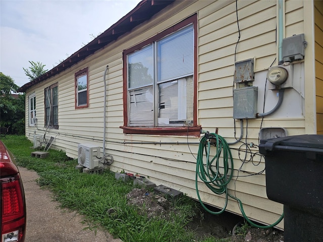 6504 Ave J, Houston, TX 77011 - view of side of property with a cooling unit