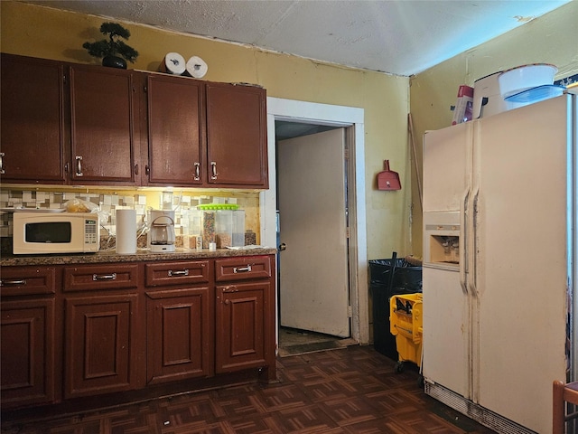 6504 Ave J, Houston, TX 77011 - kitchen with white appliances and backsplash