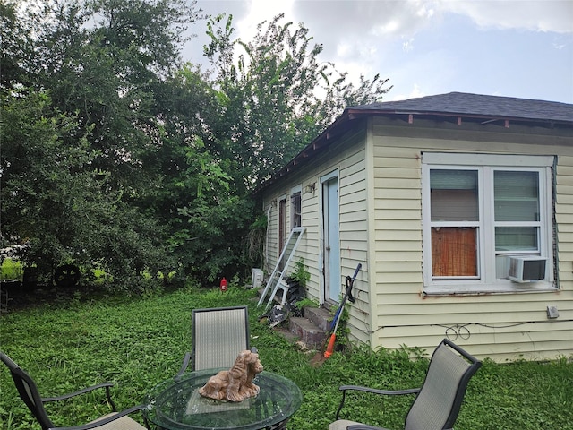 6504 Ave J, Houston, TX 77011 - view of side of home with cooling unit and entry steps