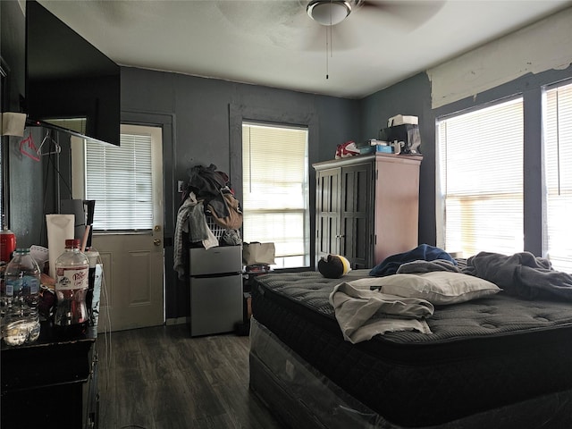 6504 Ave J, Houston, TX 77011 - bedroom featuring dark wood finished floors and ceiling fan