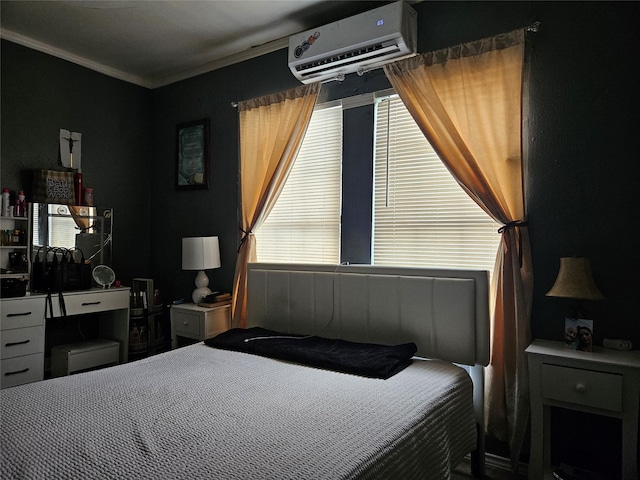 6504 Ave J, Houston, TX 77011 - bedroom with an AC wall unit and ornamental molding