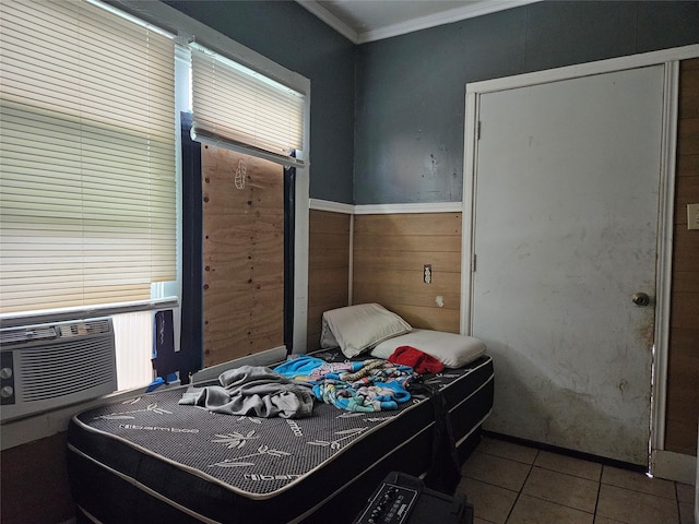 6504 Ave J, Houston, TX 77011 - tiled bedroom with ornamental molding and wood walls
