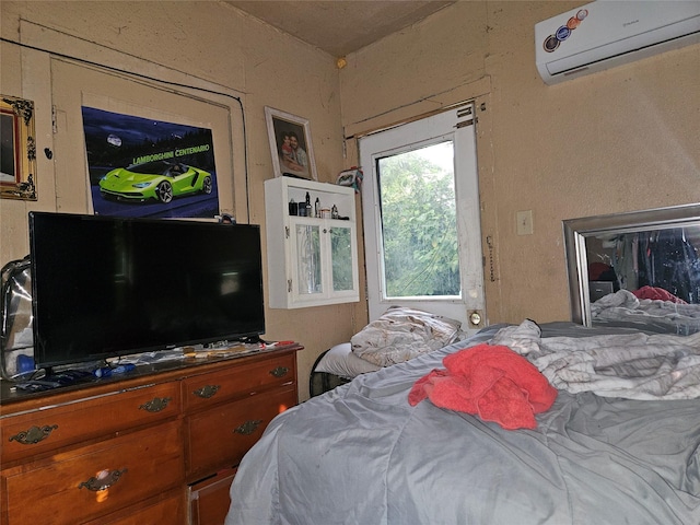 6504 Ave J, Houston, TX 77011 - bedroom featuring an AC wall unit