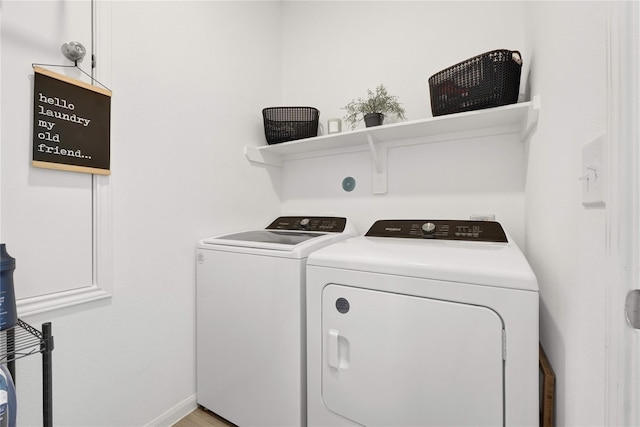 23823 Escardilla Ln, Hockley, TX 77447 - laundry room featuring washer and dryer and baseboards
