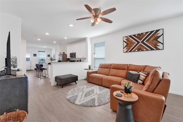 23823 Escardilla Ln, Hockley, TX 77447 - living area with light wood-style floors, ceiling fan, and recessed lighting