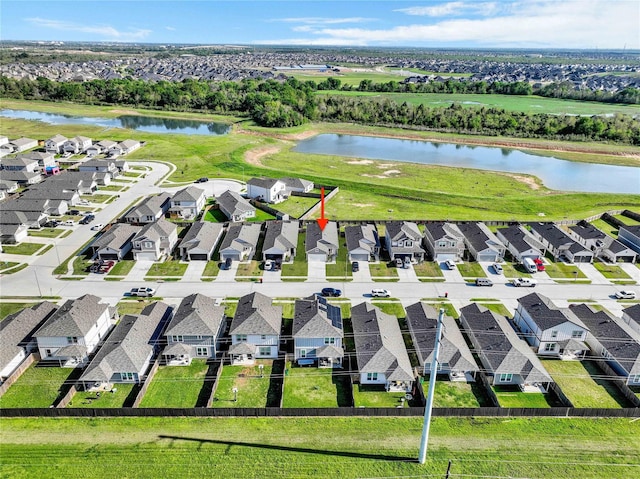 23823 Escardilla Ln, Hockley, TX 77447 - aerial perspective of suburban area with a large body of water