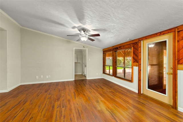 925 Royal Oak Dr, Dickinson, TX 77539 - spare room featuring a ceiling fan, wood finished floors, crown molding, a textured ceiling, and lofted ceiling