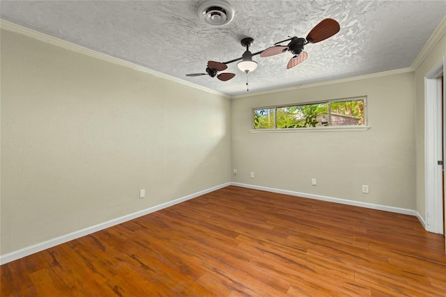 925 Royal Oak Dr, Dickinson, TX 77539 - spare room featuring ceiling fan, wood finished floors, crown molding, and a textured ceiling