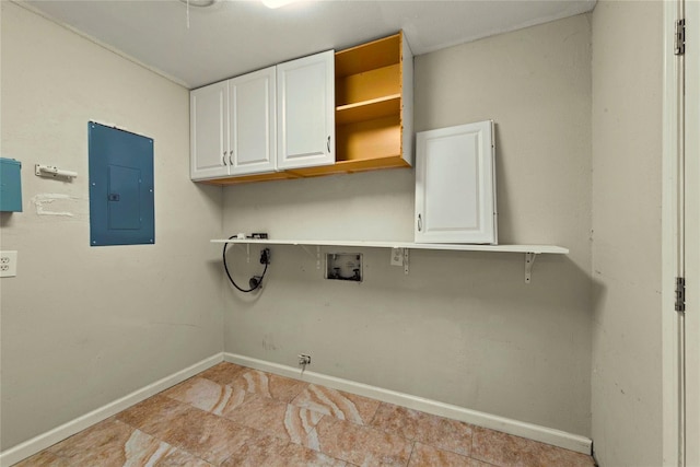 925 Royal Oak Dr, Dickinson, TX 77539 - laundry room with electric panel, washer hookup, cabinet space, and gas dryer hookup