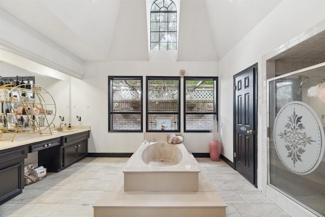 14907 Alderwick Dr, Sugar Land, TX 77498 - bathroom featuring high vaulted ceiling, a tub with jets, a shower stall, and vanity