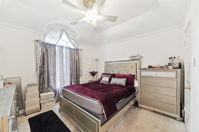 14907 Alderwick Dr, Sugar Land, TX 77498 - bedroom with light colored carpet, ornamental molding, a ceiling fan, and a raised ceiling