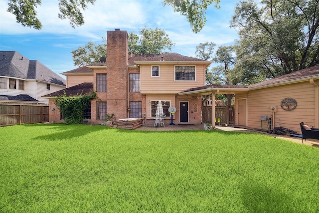 14907 Alderwick Dr, Sugar Land, TX 77498 - back of property featuring a chimney and brick siding
