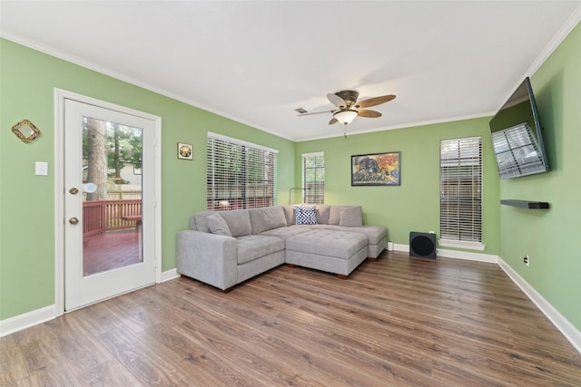 3 Whistlers Walk Pl, The Woodlands, TX 77381 - living area featuring crown molding, wood finished floors, and a ceiling fan