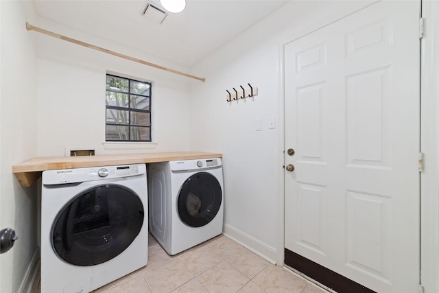 3 Whistlers Walk Pl, The Woodlands, TX 77381 - laundry room with separate washer and dryer and light tile patterned floors