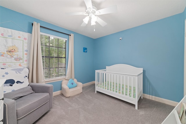 3 Whistlers Walk Pl, The Woodlands, TX 77381 - carpeted bedroom with a ceiling fan and a nursery area