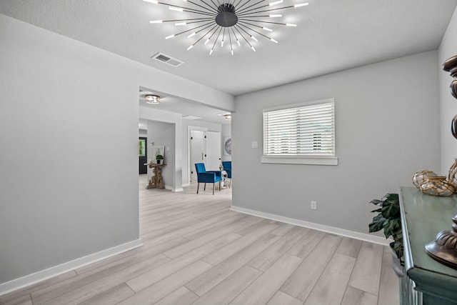 5709 David St, Dickinson, TX 77539 - empty room featuring baseboards and light wood-type flooring