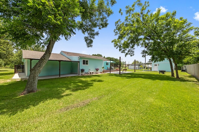 5709 David St, Dickinson, TX 77539 - view of yard with a patio area