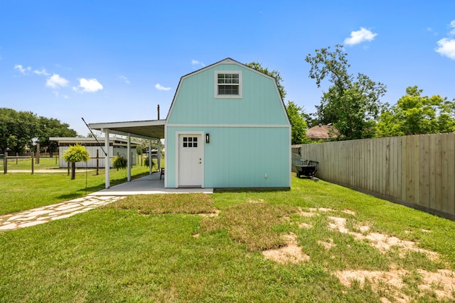 5709 David St, Dickinson, TX 77539 - view of outbuilding featuring a carport