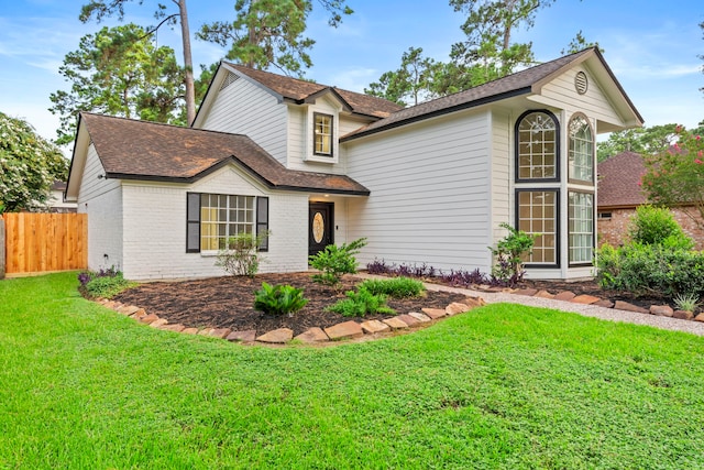 12135 Quail Creek Dr, Houston, TX 77070 - traditional-style home featuring roof with shingles and brick siding