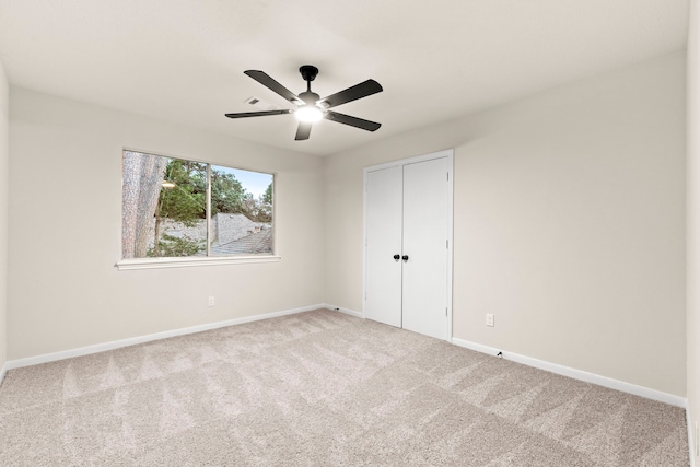 12135 Quail Creek Dr, Houston, TX 77070 - unfurnished bedroom with carpet flooring, a closet, and a ceiling fan