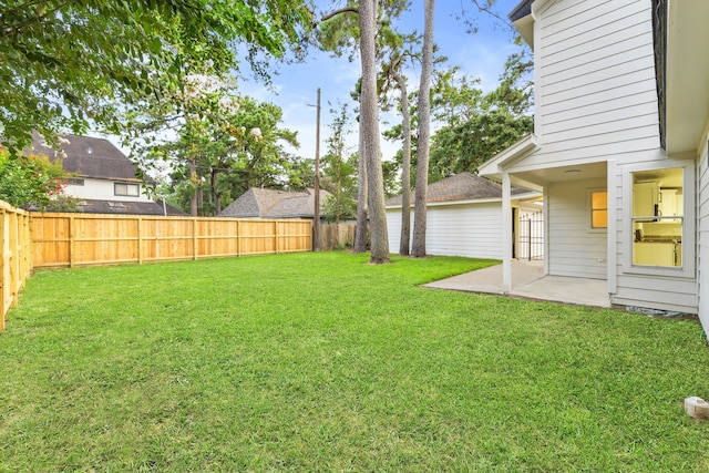 12135 Quail Creek Dr, Houston, TX 77070 - fenced backyard with a patio area