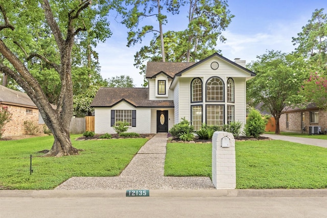 12135 Quail Creek Dr, Houston, TX 77070 - traditional-style house with roof with shingles