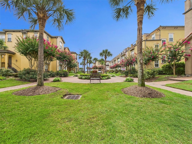 22 Tassia Ln, Pasadena, TX 77058 - view of community with a residential view and a lawn