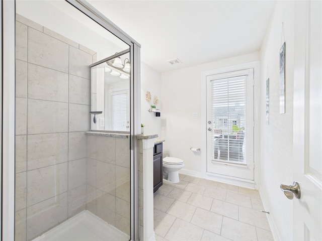 22 Tassia Ln, Pasadena, TX 77058 - full bath featuring vanity, tiled shower, and tile patterned flooring