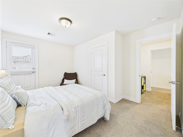22 Tassia Ln, Pasadena, TX 77058 - bedroom featuring light colored carpet and baseboards