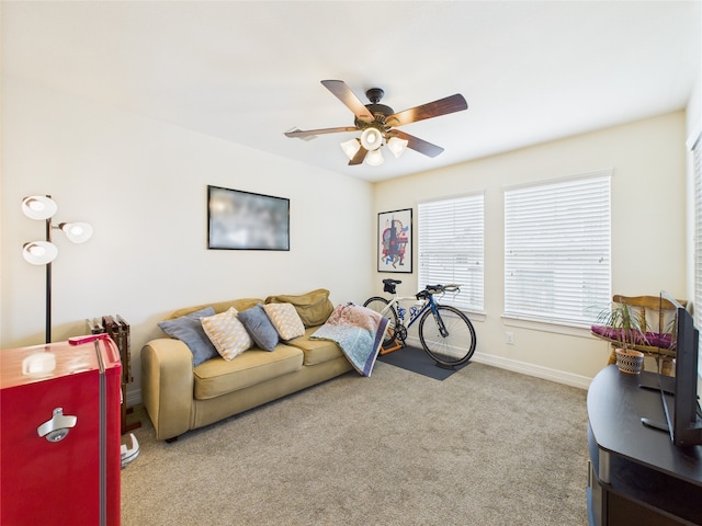 22 Tassia Ln, Pasadena, TX 77058 - carpeted living area with ceiling fan and baseboards