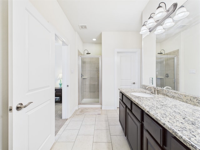 22 Tassia Ln, Pasadena, TX 77058 - bathroom featuring a shower stall and vanity