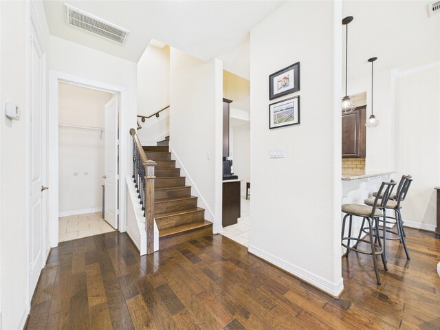 22 Tassia Ln, Pasadena, TX 77058 - foyer entrance with wood finished floors and stairway