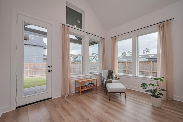 16819 Chapel Knox Dr, Humble, TX 77346 - sitting room with vaulted ceiling, light wood-type flooring, and healthy amount of natural light
