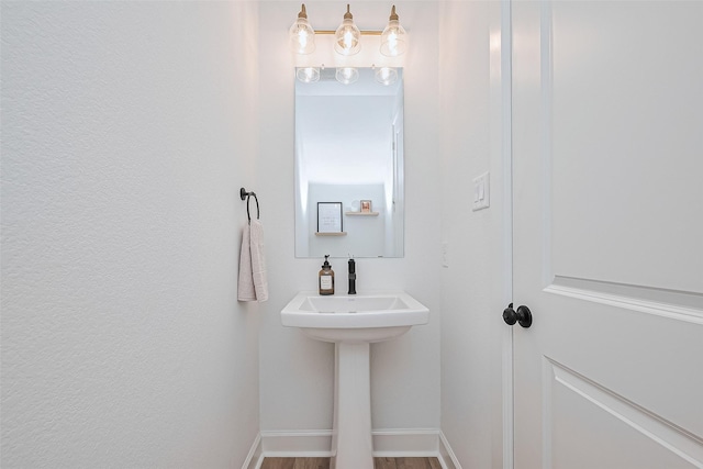 16819 Chapel Knox Dr, Humble, TX 77346 - bathroom with wood finished floors and baseboards