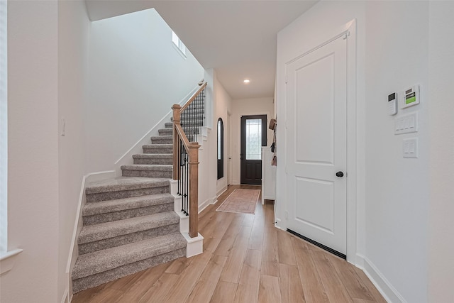16819 Chapel Knox Dr, Humble, TX 77346 - foyer entrance with stairway, light wood-type flooring, and recessed lighting