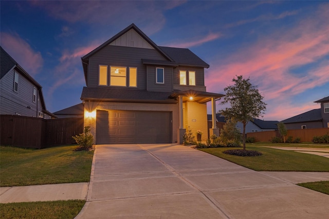 16819 Chapel Knox Dr, Humble, TX 77346 - view of front facade with driveway, a garage, and board and batten siding