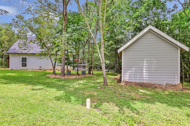 561 N Royale Greens Dr, Coldspring, TX 77331 - view of grassy yard