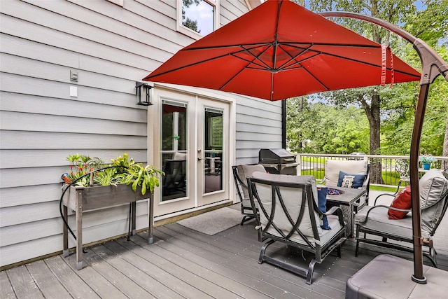 561 N Royale Greens Dr, Coldspring, TX 77331 - deck featuring french doors, grilling area, and outdoor lounge area