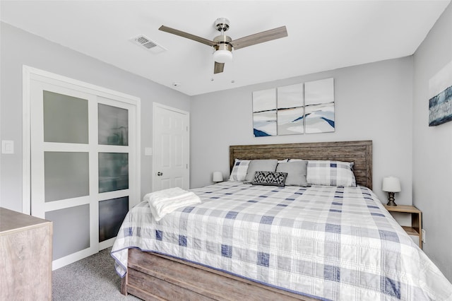 561 N Royale Greens Dr, Coldspring, TX 77331 - bedroom with carpet flooring and ceiling fan