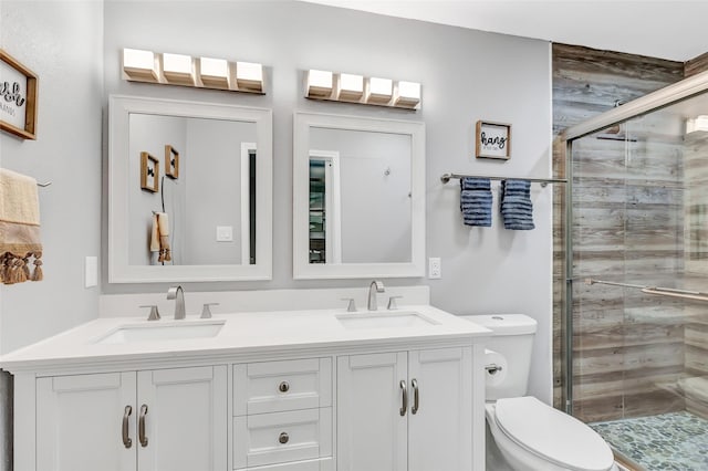 561 N Royale Greens Dr, Coldspring, TX 77331 - bathroom with double vanity and a stall shower