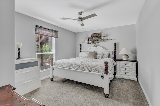 561 N Royale Greens Dr, Coldspring, TX 77331 - bedroom with carpet flooring and a ceiling fan