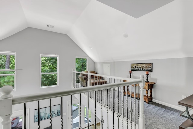 561 N Royale Greens Dr, Coldspring, TX 77331 - hallway with an upstairs landing, carpet flooring, and vaulted ceiling