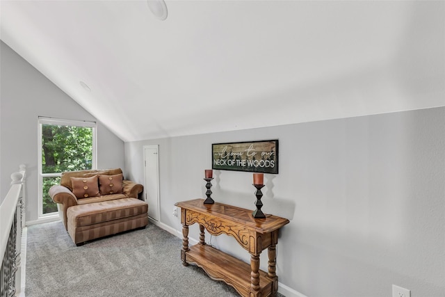 561 N Royale Greens Dr, Coldspring, TX 77331 - living area featuring vaulted ceiling and carpet flooring