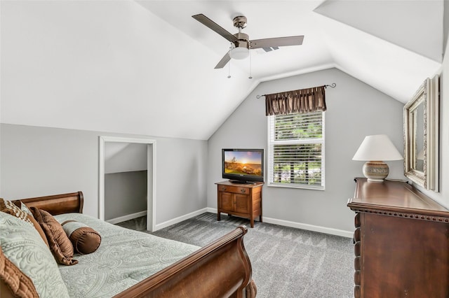 561 N Royale Greens Dr, Coldspring, TX 77331 - carpeted bedroom with lofted ceiling and ceiling fan