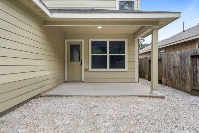 9987 Sterling Place Dr, Conroe, TX 77303 - entrance to property featuring a patio