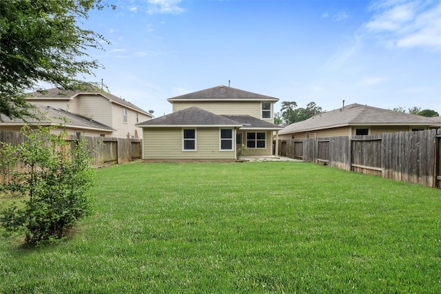 9987 Sterling Place Dr, Conroe, TX 77303 - back of house with a fenced backyard