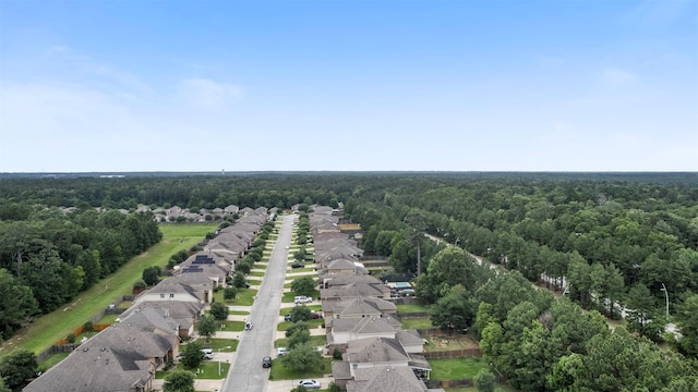 9987 Sterling Place Dr, Conroe, TX 77303 - aerial perspective of suburban area with a forest
