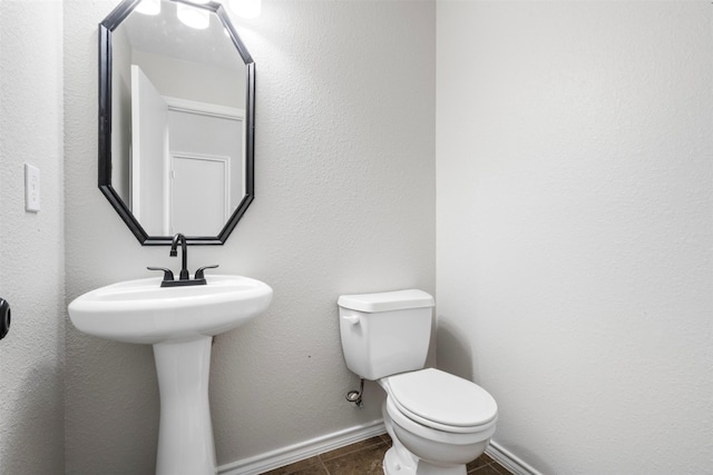 9987 Sterling Place Dr, Conroe, TX 77303 - bathroom with toilet and tile patterned flooring