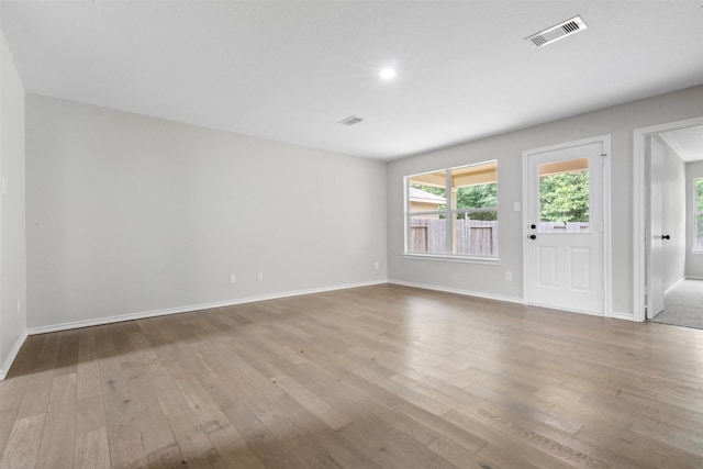 9987 Sterling Place Dr, Conroe, TX 77303 - spare room featuring wood-type flooring and baseboards